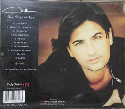 Çelik *Onu Düşünürken * ( İkinci El ) CD Müzik CD934 - 2