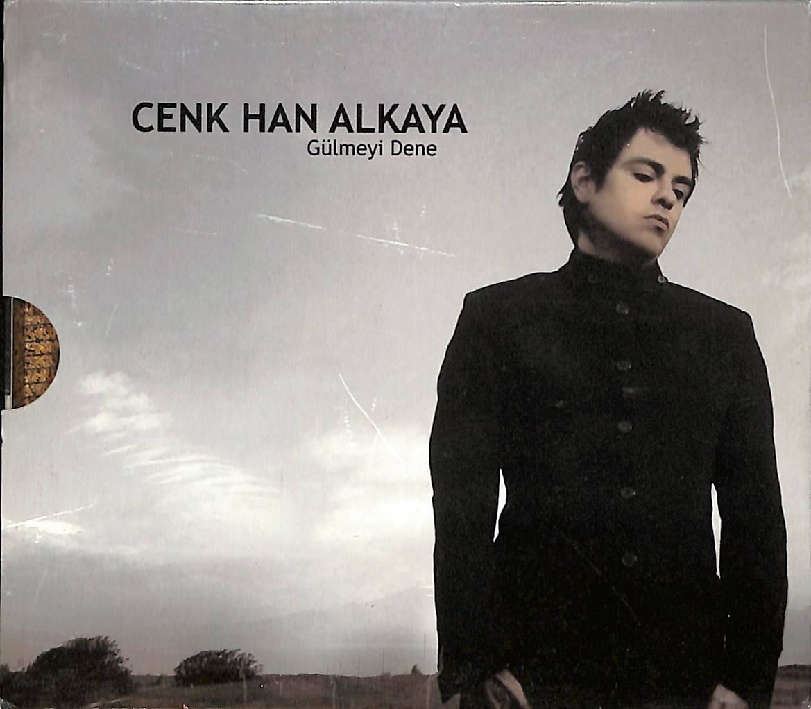 Cenk Han Alkaya - Gülmeyi Dene CD (İkinci El) CD4809 - 1