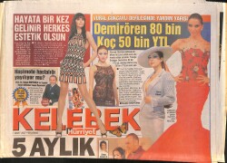 Hürriyet Gazetesi Kelebek Eki 1 Mart 2007 - Vural Gökçaylı Defilesinde Yardım Yarışı GZ157638 - Gökçekoleksiyon