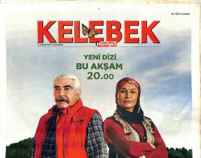 Hürriyet Gazetesi Kelebek Eki 11 Aralık 2013 - Hande Yener , Elinde Nazar Boncuğuyla Poz Verdi GZ116100 - 1
