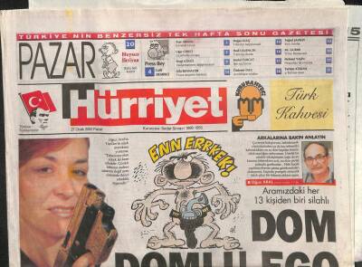 Hürriyet Gazetesi Pazar Eki 27 Ocak 2002 - Oğuz Aralın Türklerin Silah Merakına Yorumu GZ113045 - 1