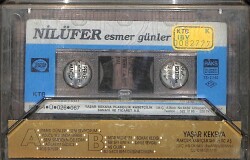 Nilüfer - Esmer Günler Orijinal Kaset (İkinci El) * Sarı Bandrol - Kâğıt Baskı * KST31128 - 2