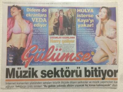 Vatan Gazetesi Gülümse Eki 14 Kasım 2005 - Hülya Avşar İsterse Kayayı Yakar GZ47283 - 1